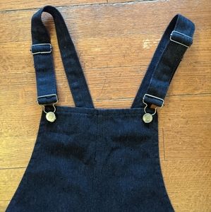 black overall skirt with suspenders